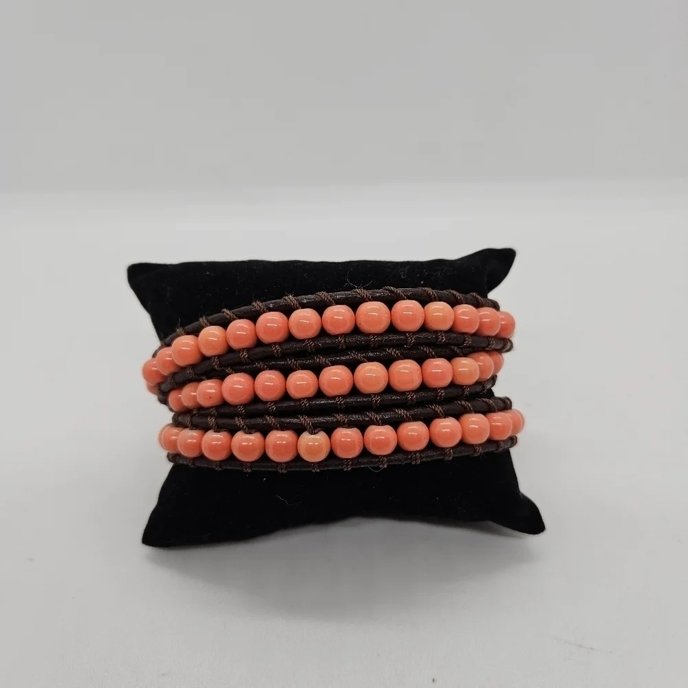 brown leather cord wrap bracelet with coral orange beads